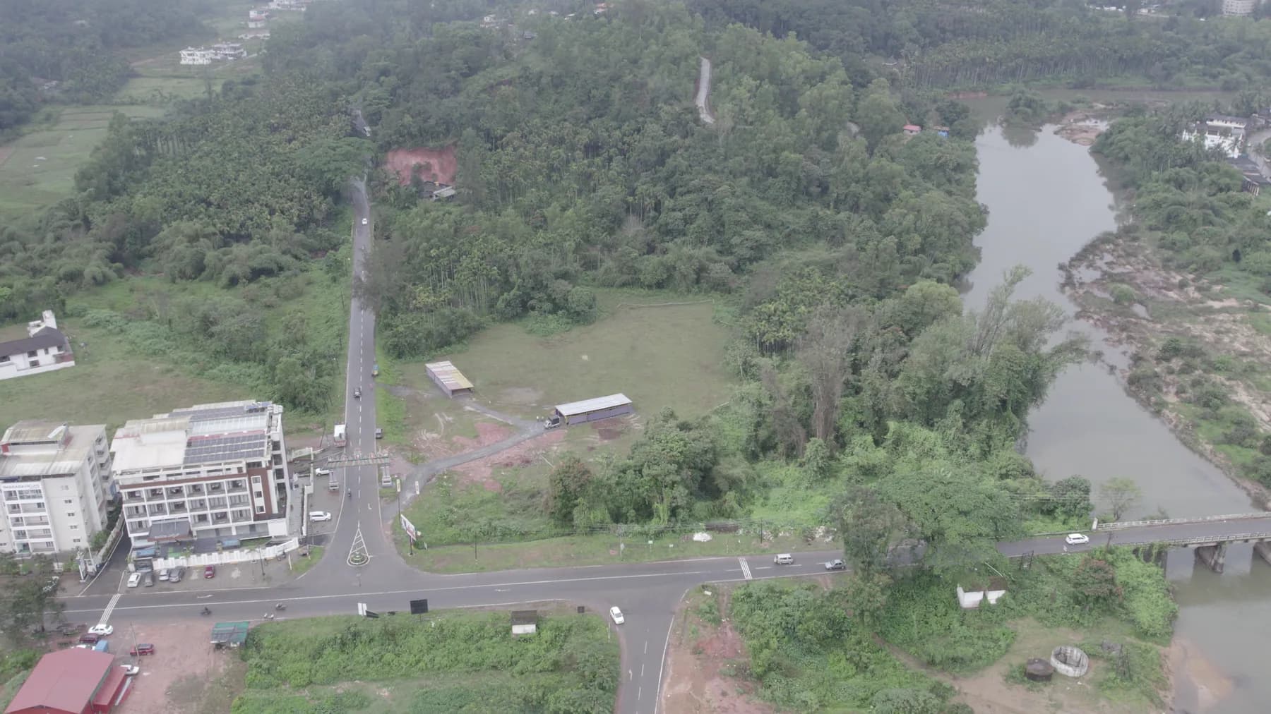 Aerial view placing Vani Vilasa within Sringeri's river and green landscape